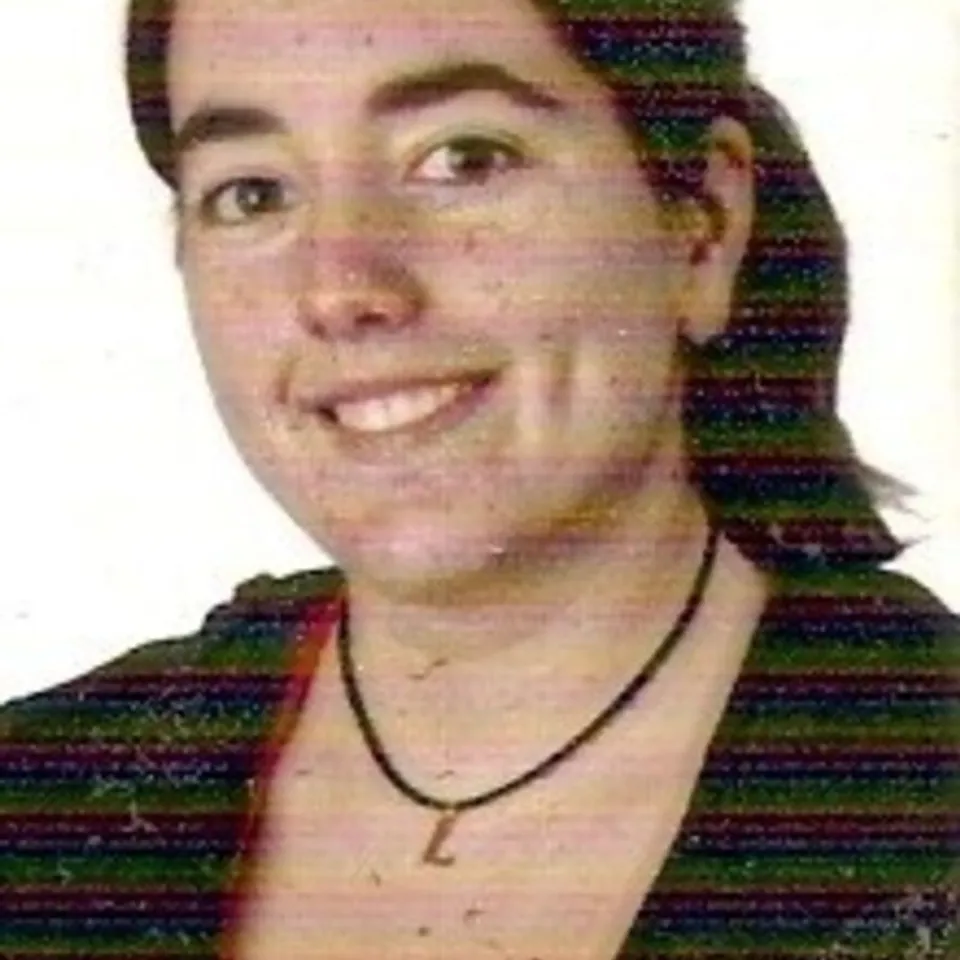 Laura E.